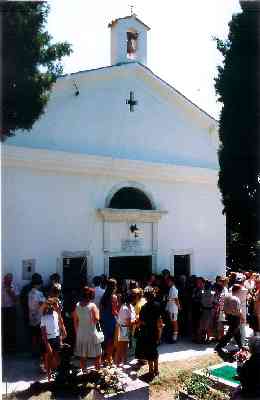 Reunion goers outside the newly restored Svetog Juraj, Brdo. 1998.