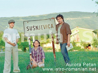 'Formula As' Team consisting of Cătălin Manole, Aurora Pețan and Bogdan Lupescu posing with the sign at the entrance in Šušnjevica